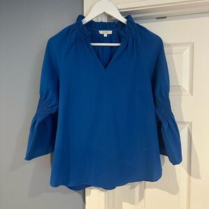 Jade Cobalt Blue V-Neck Blouse with Ruffle Collar and Smocked Sleeves